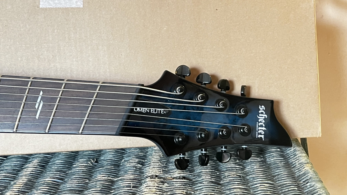 SCHECTER Omen Elite 8 MultiScale, See Thru Blue Burst, Sonderpreis